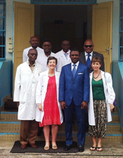 Course Director Dr. Esther Cubo (in red) gathers with participants.